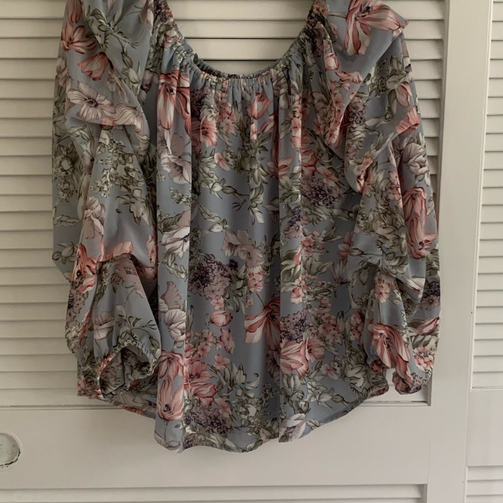 Kori off shoulder sheer blouse with a full lining very La Femme.